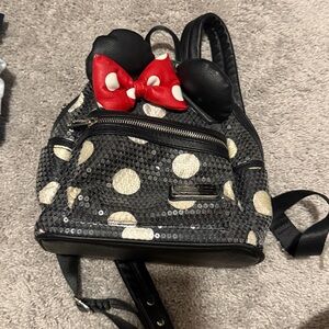 Lounged 
Black and White Polka Dot Mini Backpack with Red Bow